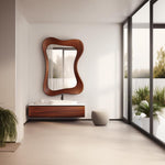 May include: A modern bathroom featuring a large, uniquely shaped wooden mirror above a floating vanity with a white countertop. The room has large windows, a neutral color palette, and a small, rounded stool.