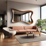 May include: A modern living room featuring a large, wavy-edged wooden mirror above a blush-colored sofa. A matching wooden coffee table and a light gray armchair complete the seating area. The room has hardwood floors and a large window.